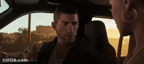 Man And Woman Talking In Car GIF