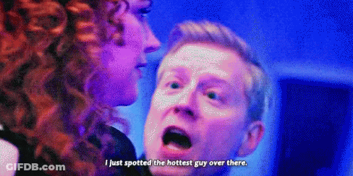 Man And Woman Talking In Dark Room GIF