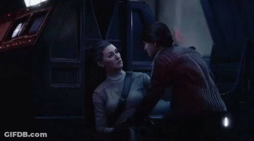 Man And Woman Talking In Dark Room GIF