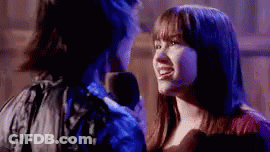 Man And Woman Talking In Dark Room GIF