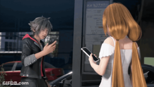 Man And Woman Talking In Front Of Sign Saying A GIF