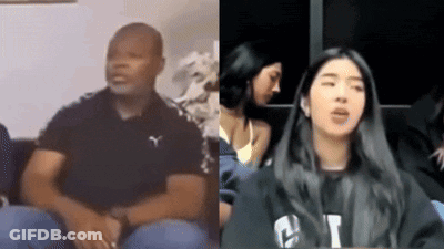 Man And Woman Talking On Couch GIF