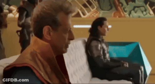 Man And Woman Talking On Couch GIF