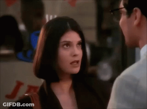 Man And Woman Talking, Woman Wearing Glasses GIF
