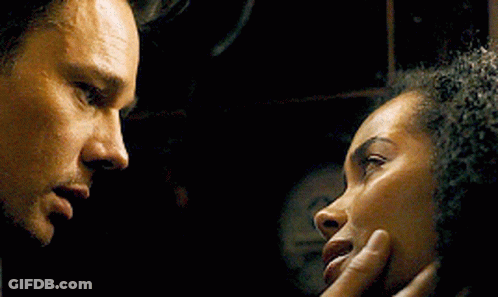 Man And Woman Touching Each Other's Faces GIF