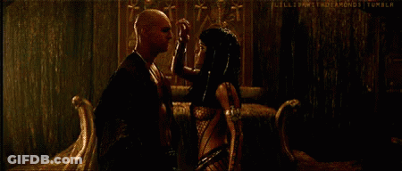Man And Woman Touching Each Other's Faces GIF