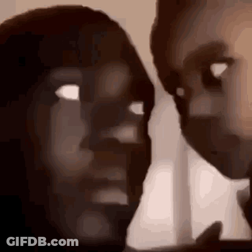 Man And Woman Touching Faces GIF