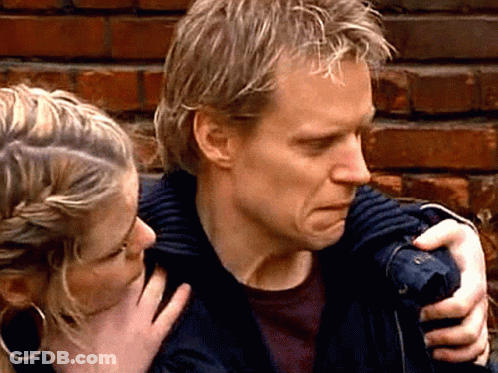 Man And Woman Touching Shoulder GIF