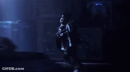Man And Woman Walking In Gym GIF