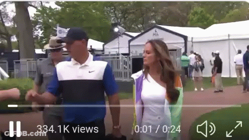 Man And Woman Walking On Golf Course GIF