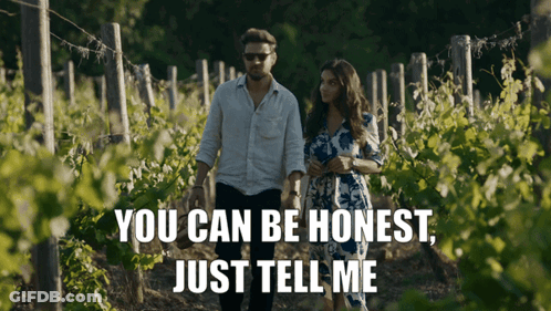 Man And Woman Walking Through Vineyard Saying You Can Be Honest GIF