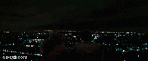 Man And Woman Watching City Lights GIF