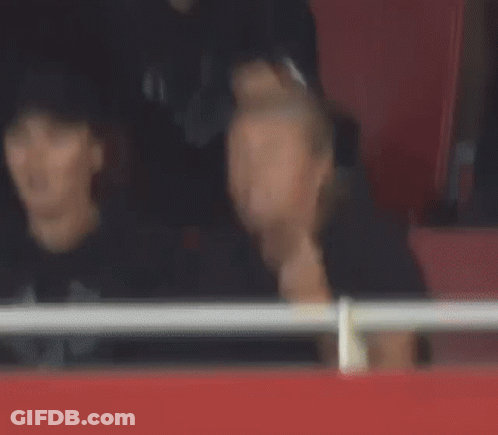 Man And Woman Watching Game GIF