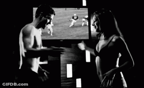 Man And Woman Watching TV GIF