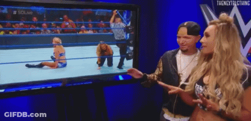 Man And Woman Watching Wrestling GIF
