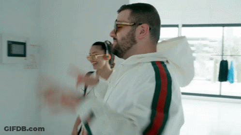 Man And Woman Wearing Sunglasses Dancing GIF