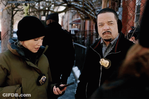 Man And Woman With Amanda Rolling Badge GIF