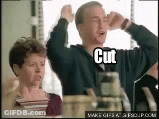 Man And Woman With Arms Up Saying Cut GIF