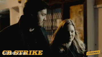 Man And Woman With CB Strike GIF