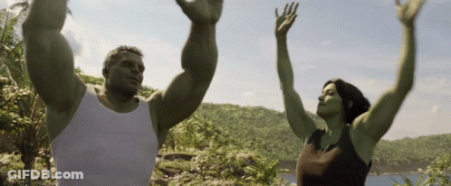 Man And Woman With Hands In The Air GIF