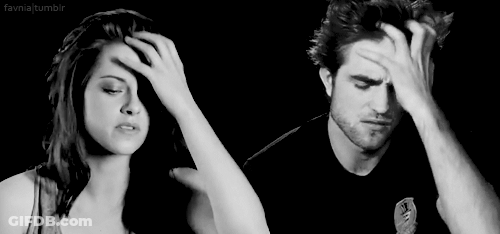 Man And Woman With Hands On Head GIF