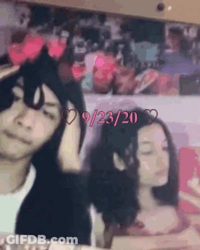 Man And Woman With Hearts On Heads 9/25/20 GIF