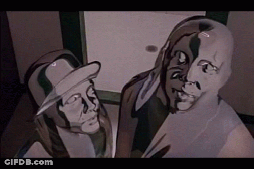Man And Woman With Painted Faces GIF