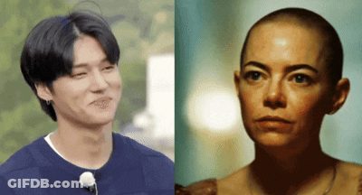 Man And Woman With Shaved Heads Standing Together GIF