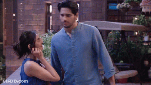 Man And Woman Woman Touching Man's Neck GIF