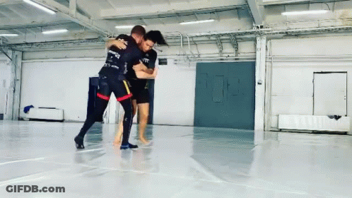 Man And Woman Wrestling GIF