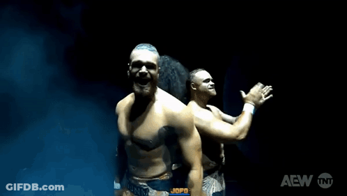 Man And Woman Wrestling In Water With AEW Logo GIF