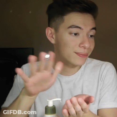 Man Applying Lotion To Hand GIF