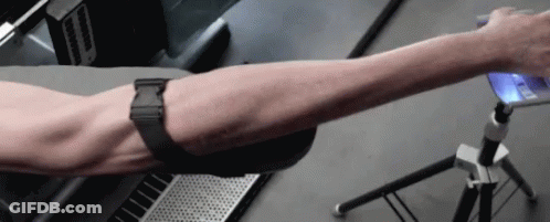 Man Arm With Watch Holding Cell Phone GIF