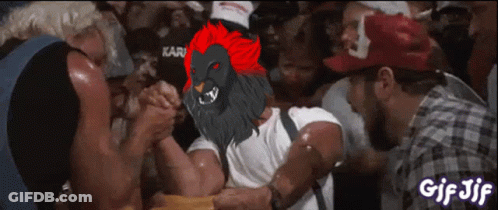 Man Arm Wrestling Another Man In Lion Mask GIF