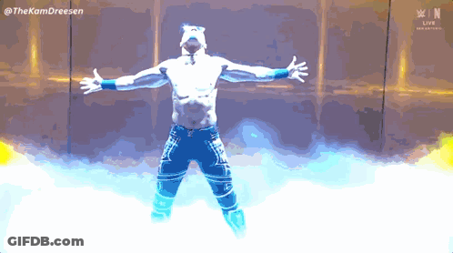 Man Arms Outstretched Before Thekamdreesen Sign GIF