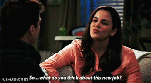 Man Asking Woman About New Job GIF