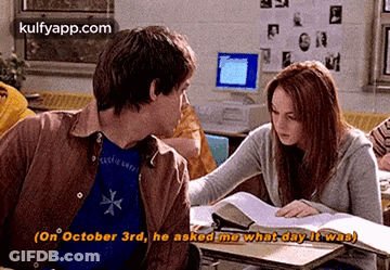 Man Asking Woman What Day It Was In Classroom GIF