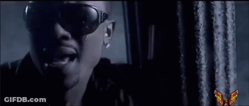 Man At Blue House With White Picket Fence GIF
