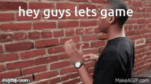 Man At Brick Wall Saying Hey Guys Lets Game GIF
