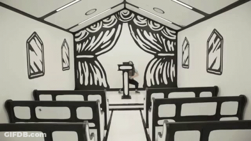 Man At Church Podium With Zebra Print Wall GIF