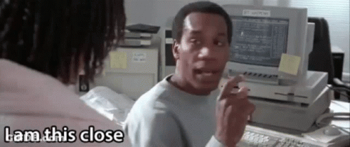 Man At Computer Saying I Am This Close GIF