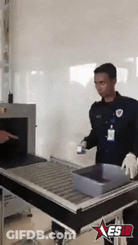 Man At Conveyor Belt With Star Saying Esid GIF