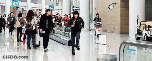 Man At Conveyor Belt With Star Saying ESID GIF