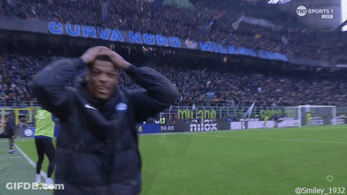 Man At Curva Nord Sign On Soccer Field GIF