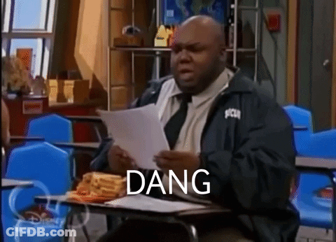 Man At Desk Holding Paper Saying Dang GIF