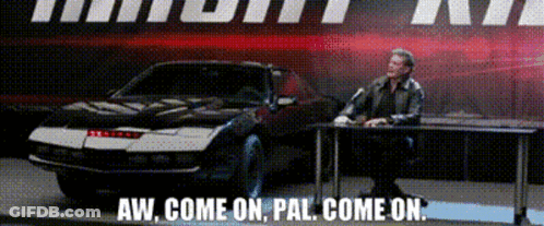 Man At Desk In Front Of Car With Words Aw Come On Pal Come On GIF