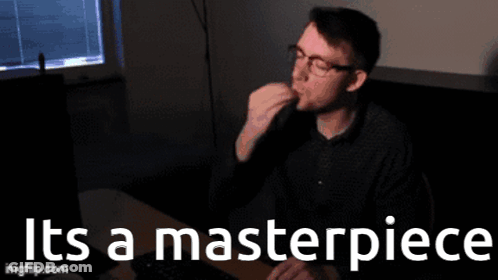 Man At Desk Saying It's A Masterpiece GIF