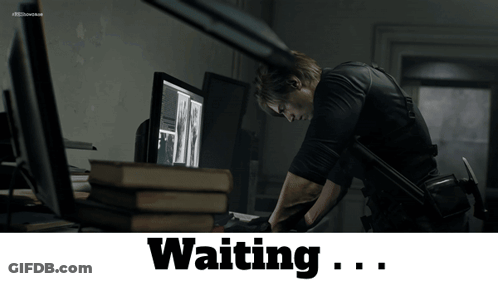 Man At Desk Waiting GIF