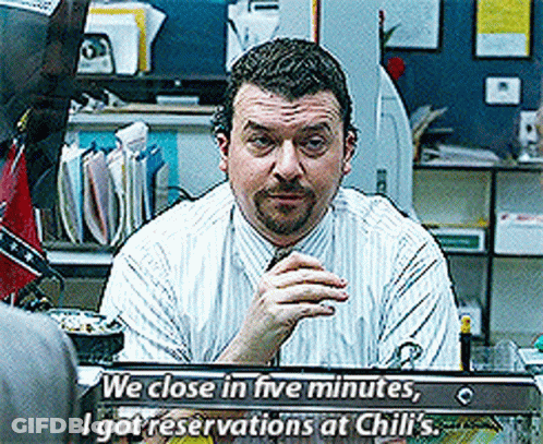 Man At Desk We Close In Five Minutes GIF