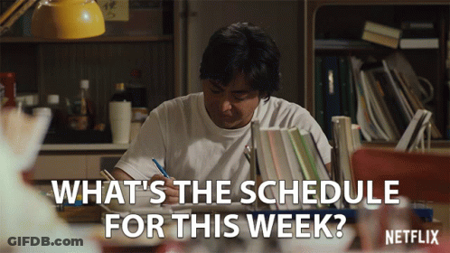 Man At Desk What's The Schedule For This Week GIF